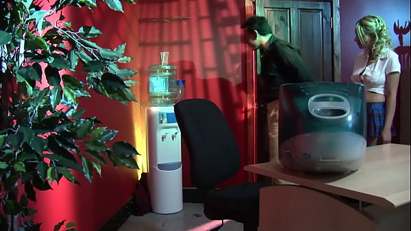 Image A sexy blonde, after fucking on the desk and on the chair, gets a cum load on her mouth and a golden shower on her big boobs