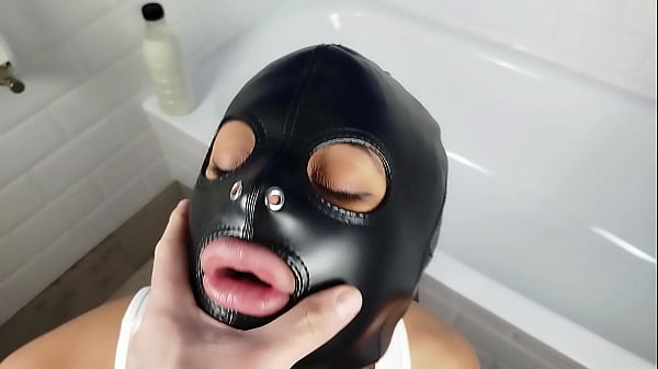 Image Pervert bitch sucks my cock in the bathtub and I fuck her face with leather slave mask