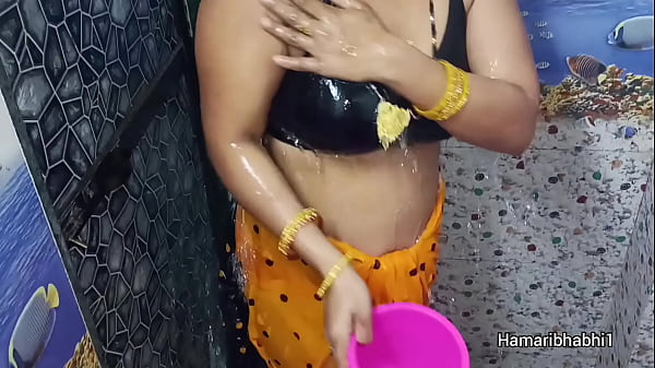 Image Indian Desi Bhabhi Bathing And Removing Her sexy saree.