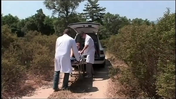 Image the two doctors fuck the busty patient in the middle of the countryside