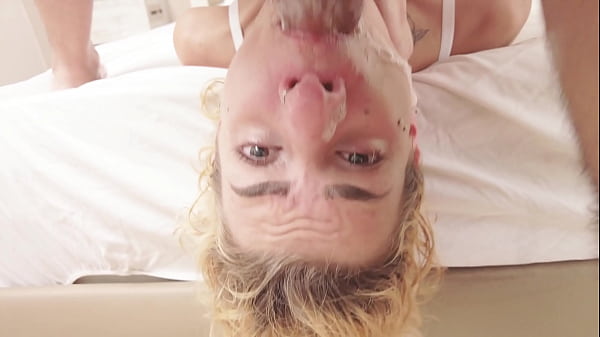 Image Skinny blonde bimbo gets a messy throatfuck