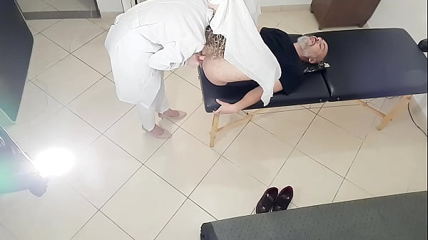 Image Doctor who performs a prostate exam ends up sticking a strap-on in the patient's ass.