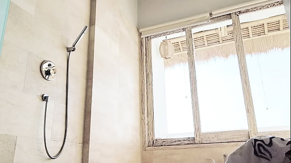 Image washing clothes while showering during traveling