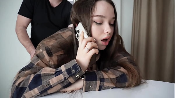 Image Fucking my stepsister while she's on the phone.