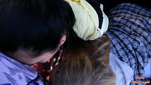 Image Outdoor double blowjob in a car trunk