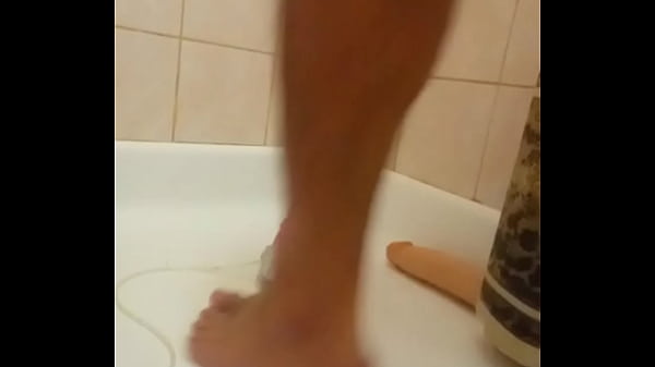 Image Jumping on a horse dildo and pissing