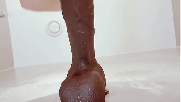 Image Twink enjoying 11inches black dildo