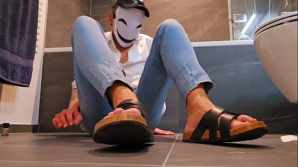 Image Twink wanks in jeans and birkenstock