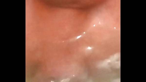 Image Masturbating my rose with a jet of hot water from the shower