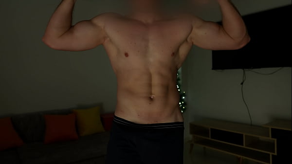 Image Muscular guy poses before orgasm