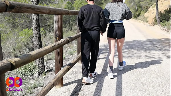 Image Pissing on her and him outdoors with risky sex
