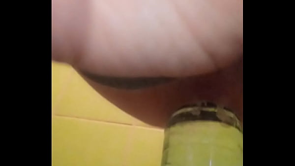 Image The guy moans and squirts without using his hands while sitting on a huge bottle.