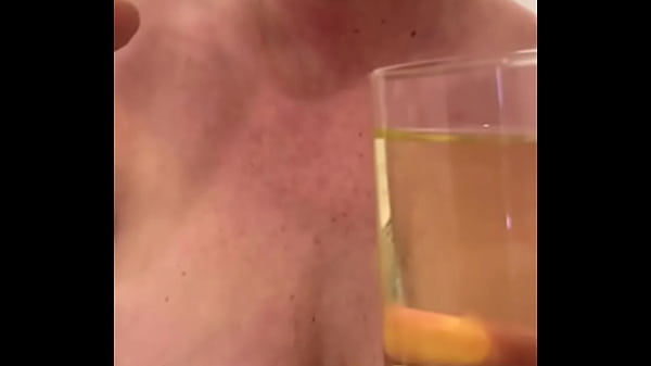 Image Filled up two Glasses by My Strong Stream Pee and next Put in My Mouth and Spitting on my Big Tits