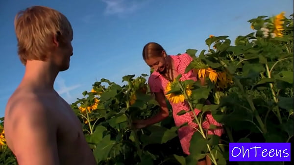 Image Kitty and Mark in a Sunflower Field