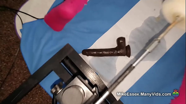 Image Locked in chastity and getting fucked in the ass with a thrusting dildo