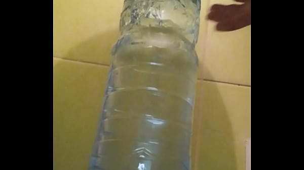 Image I moan from the giant bottle and cum twice.