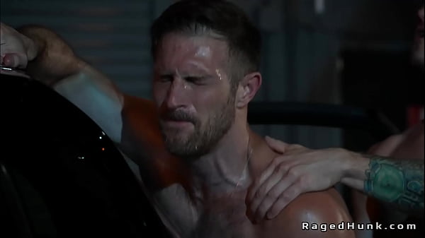 Image Gay driver anal fucks client in a trunk in an abandoned garage