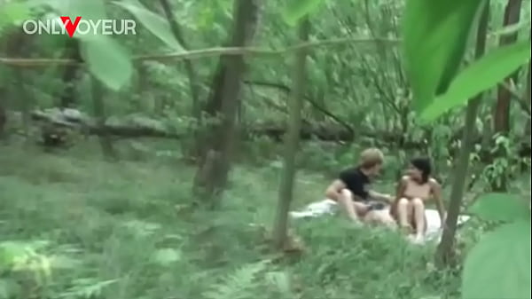 Image Beach Voyeur. Teen couple spotted fucking in a beach bushes