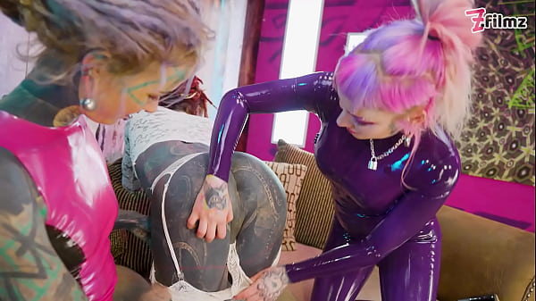 Image Can She Take Two Fists - Sissy getting fisted by two chicks in LATEX