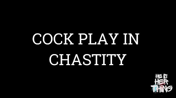 Image Mistress Plays with Slave's Cock in the Cage