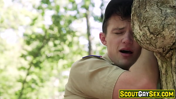 Image Boy scout Grant Ducati anal fucked against a tree in the forest by scoutmaster Jordan Starr