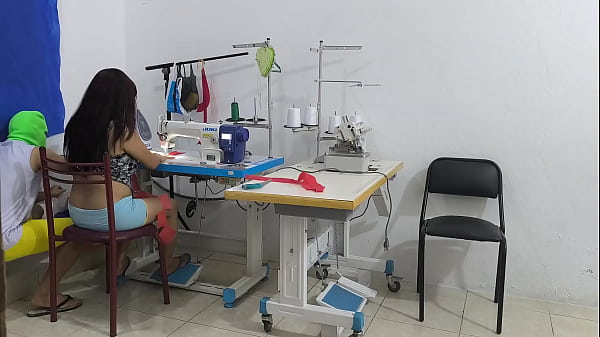 Image A horny and slutty seamstress seduces her coworker. She invites him over for sex, and her partner sucks her vagina like a whore.