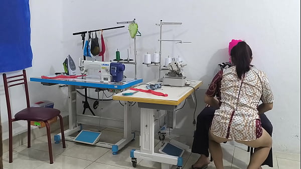 Image intense seduction in the sewing workshop