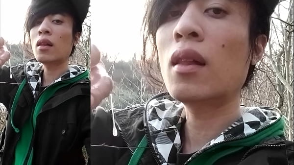 Image Outdoors, Jon Arteen masturbates his tumescent twink cock, ejaculates cum that sticks to his fingers and slowly drips.
