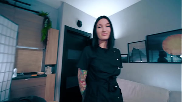 Image Sexy nurse in latex gloves helped her patient collect a semen analysis