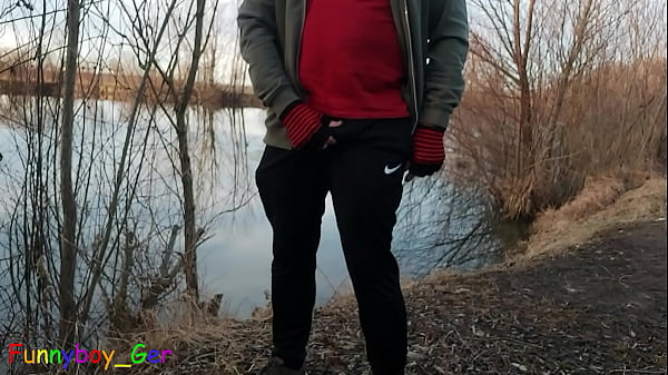 Image Outside by the lake, jerking off with a band around your cock and balls and showing your asshole (S)