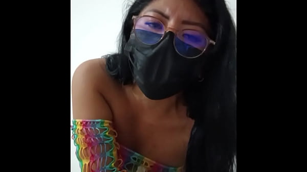 Image Opening her pussy and inserting a pink dildo, she shows her wet pussy
