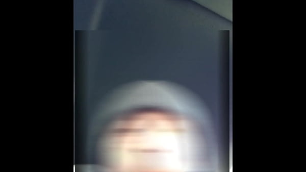 Image Branlette dans la voiture sur un parking,