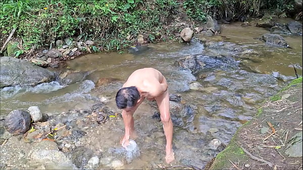 Image Peasant woman fucks outdoors in the jungle by a forest river - BUSTY AND BIG ASS