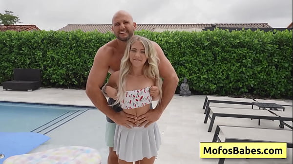 Image Emma Bugg, JMac: Petite and naughty blonde teen sucking huge dick by the pool and loves it