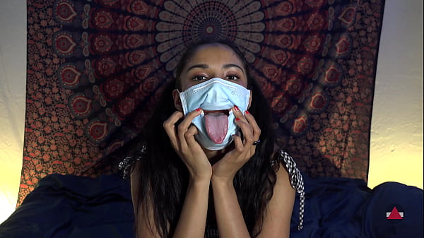 Image She took off her mask to lick cock