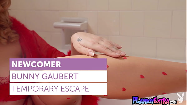 Image Petite redhead MILF musician Bunny Gaubert taking off her sexy lingerie