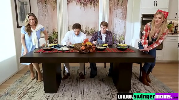Image Family dinner ends with busty stepmothers fucking their stepsons' cocks in intense sexual exchange.