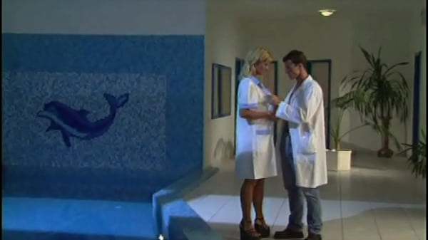 Image Doctor and nurse work overtime fucking in the pool