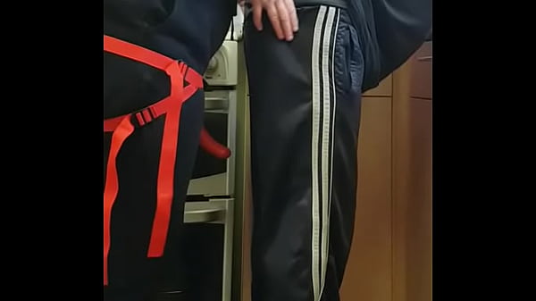 Image looking out my kitchen window when my girlfriend pulled down my pants and started fucking my asshole with a strap-on dildo with 9 voting down wankers