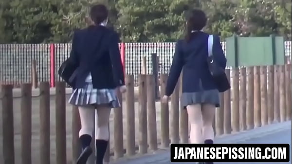 Image Cute developing Japanese girl pees hard on the bathroom floor after drinking and then cleans everything
