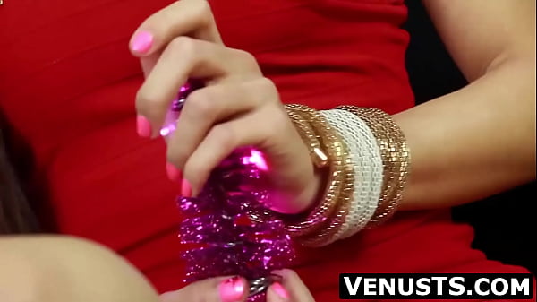 Image Asian tranny Venus Luxx is a very naughty Santa's little helper jerking off her big cock solo as a Christmas gift to herself.