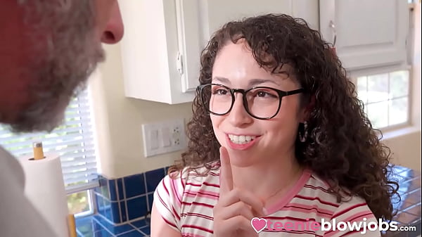Image The curly haired Pixie Smalls is showing appreciation to her handyman through a personal and sensual blowjob.