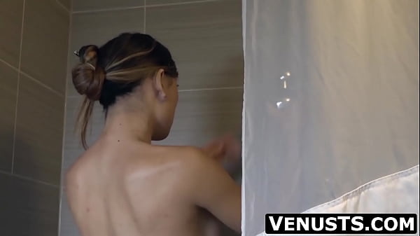Image Big tits Asian tranny Venus Luxx is fullfiling our fantasies washing her smoking hot body while slowly wanking her big cock.