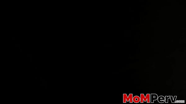 Image Nasty MILF masturbates in bed before her stepson bangs her