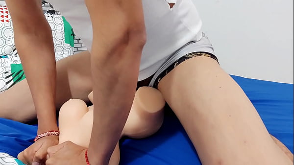 Image Young Latino gives himself a big cumshot inside his sex doll