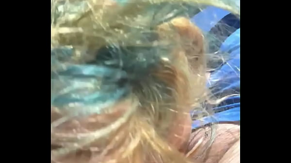 Image Cheating blonde whore sucks cock & takes a facial out in public during the middle of the day