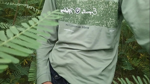 Image Horny boy jerking cock in grass field in outdoor (bigcock584)