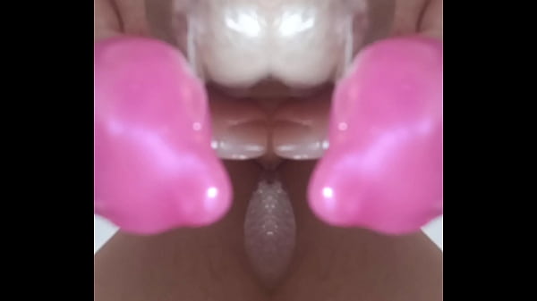 Image M90 20250707 Precum strands Drip on Pink Tipped Plug and Knotted Dildo after DP Closeup of both side by side in my anal orifice