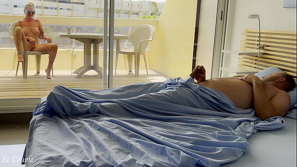 Image Naked wife was already watching nudists on street when husband woke in the morning