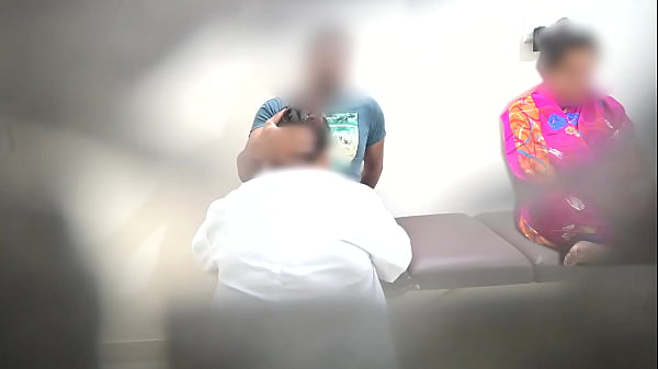 Image Doctor is giving blowjob to patient while nurse sitting besides?